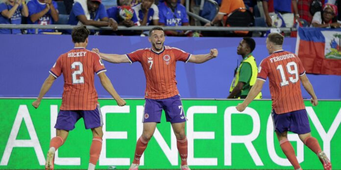 Escócia vence Haiti e assume liderança do grupo do Brasil na Copa do Mundo